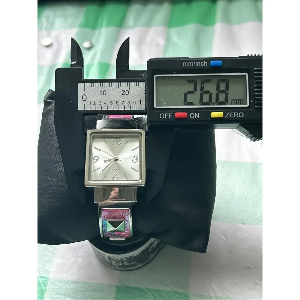 Silver Tone Pink And Multicolored Band Women’s Cuff Watch